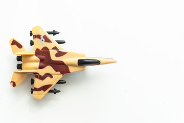 toy soldier plane pale yellow isolated on white background.