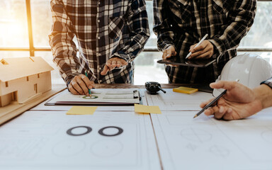 Civil engineer team meeting Modern construction planning meeting, foreman, industrial project manager, engineering team, professional team in Asian industry