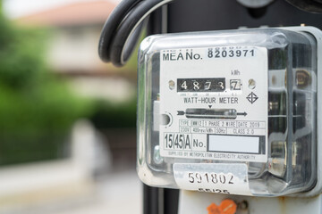 Electric measuring power meter for energy cost at home and office.