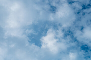 Foggy clouds on blue sky background