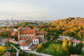 Fototapeta na wymiar Aerial view of St. Anne Church and neighbouring Bernardine Church, one of the most beautiful and probably the most famous buildings in Vilnius.
