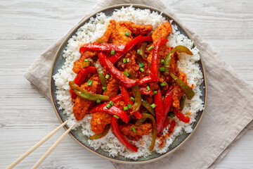 Homemade Simple Chili Chicken with White Rice on a Plate, top view.