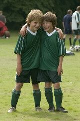 Fototapeta premium Young football player photo together on football field, AI generated