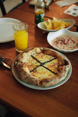 pizza with ham and cheese