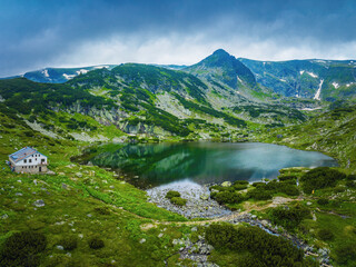 Naklejka na ściany i meble Aerial panoramic view of Seven Rila lakes and waterfalls in nature of mountain range, hiking, trekking and tourism in Bulgaria
