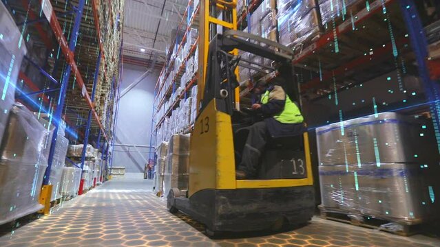 Forklift in a warehouse. Forklift in a large modern warehouse with graphics. Visualization of modern technologies in the warehouse of the factory.