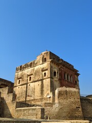 Fototapeta na wymiar Discover the breathtaking beauty of Katas Raj Temples through this stunning collection of pictures. Nestled in the serene landscape of Pakistan, these Hindu temples date back to the 6th century.