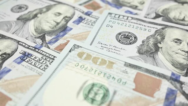 Many 100 american dollar bills. Cash money banknotes. Finance and investment concept. Closeup shot. Currency exchange of one hundred usd. Business, economy