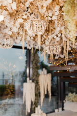 Chandelier with wooden beads in flowers