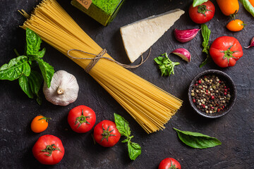 Raw spaghetti on a dark background