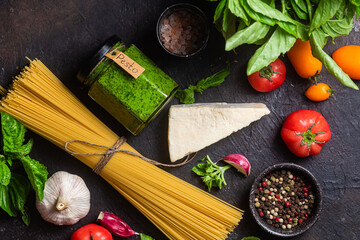 Raw spaghetti on a dark background