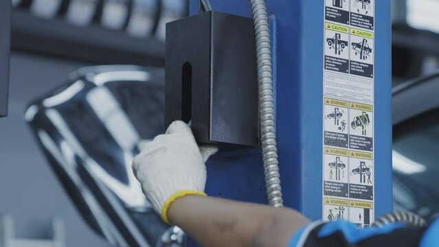 Close up put lever to lift down car 50fps
