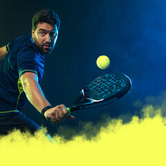 Padel tennis player celebrates victory in the game. Man athlete with paddle tenis racket on blue background. Social media ads template. Thumb up. - 624858646