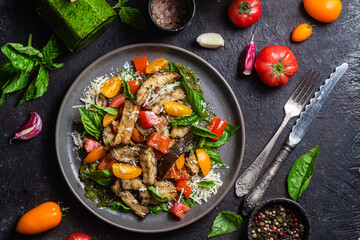Warm eggplant, pepper, tomato and basil salad