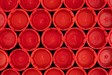 Red color bottle caps, material for recycling. 