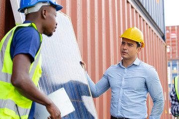 African engineer worker presenting and showing solar cell panel to customer or team colleagues. Clean energy and power saving project