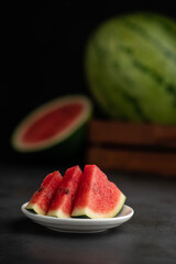 Fresh watermelon slices in a white plate
