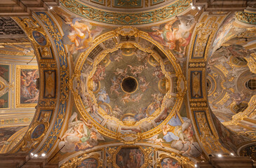 Fototapeta na wymiar GENOVA, ITALY - MARCH 5, 2023: The side cupola with the fresco of cardinal virtues and prophets and in the church Chiesa del Gesu by Bernardo Castello from 17. cent.