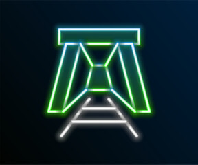 Glowing neon line Mine entrance icon isolated on black background. Colorful outline concept. Vector