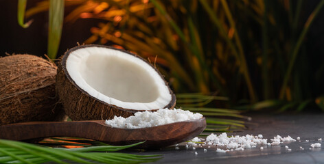 Panoramic image of fresh coconut with coconut flakes