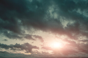 Clearing sky after rain.Natura background, clouds at sunset.