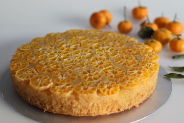 Orange upside down cake. Home baked Orange upside down cake with baby orange or clementine slices on the top.