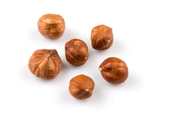 Hazelnuts on the white background