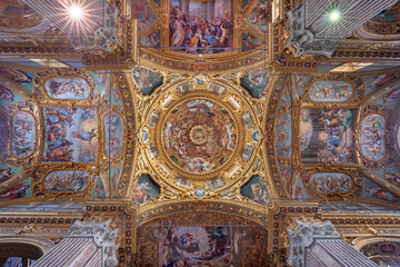 Fototapeta na wymiar GENOVA, ITALY - MARCH 6, 2023: The Assumption in cupola of the church Basilica della Santissima Annunziata del Vastato by Andrea Ansaldo (1584–1638).
