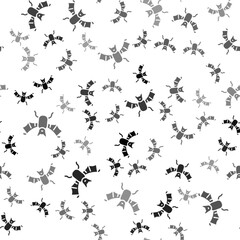 Black Flying bat icon isolated seamless pattern on white background. Happy Halloween party. Vector