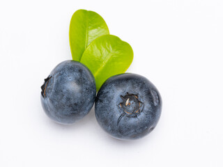 Blueberry isolated. Blueberries with leaves on white. Blueberries on a white background. Full depth of field.