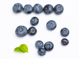 Blueberry isolated. Blueberries with leaves on white. Blueberries on a white background. Full depth of field.