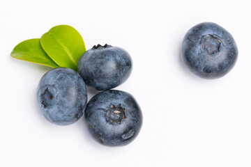 Blueberry isolated. Blueberries with leaves on white. Blueberries on a white background. Full depth of field.
