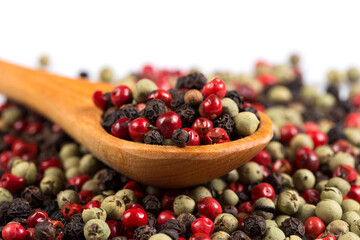 Pepper seasoning mix in wooden spoon