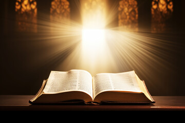 Fototapeta premium Open Holy bible book with glowing lights in church