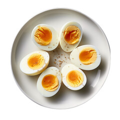 Halved boiled eggs served on a plate