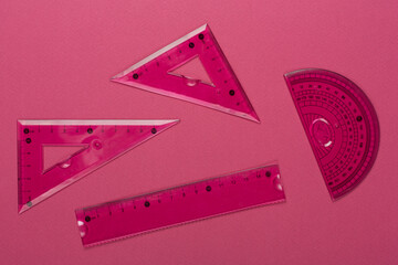 Set of transparent rulers on color backgroung, top view