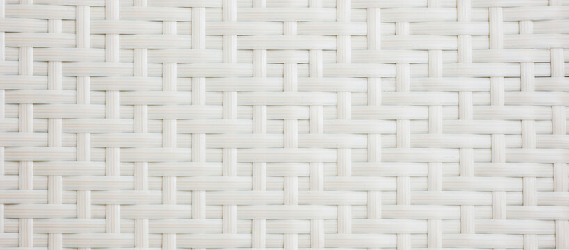 White chair with basket weave pattern