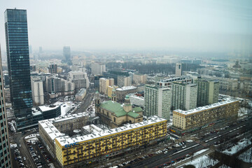 Fototapeta na wymiar View to urban Warsaw from InterContinental Warsaw hotel. Tall skyscrapers.