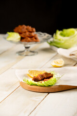 Raw meatballs or raw meatballs on a white wooden background. To close. local Turkish style raw meatballs