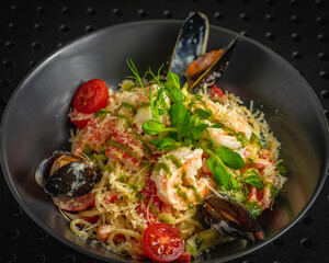 Snail salad with bread in a large bowl
