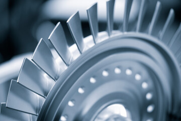 Steel blades of turbine propeller. Close-up view. Selected focus on foreground, industrial additive...