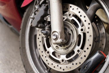 Obraz premium Motorcycle front wheel, alloy wheels with brake and clutch.