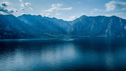 Fototapeta na wymiar Lago de Garda. Drone areal view. Mountains and lake nature view.