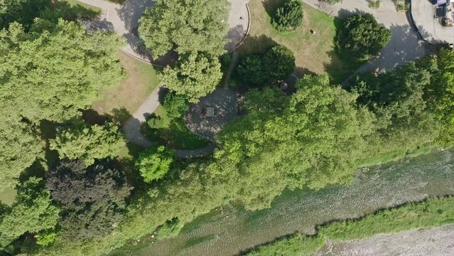 Aerial view of Swiss City of Z&uuml;rich with Platzspitz Park, Sihl River and LImmat River on a hot and sunny summer day. Movie shot July 18th, 2023, Zurich, Switzerland.