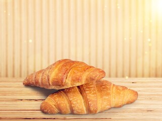 Tasty fresh Croissant bread on desk