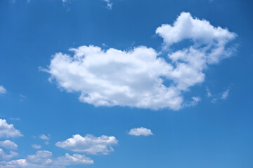 Naklejka na ściany i meble white cloud against blue sky