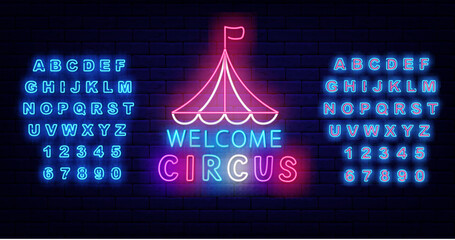 Circus neon label. Big top tent with colorful text on brick wall. Funfair advertising. Vector stock illustration © Anastasia Gapeeva