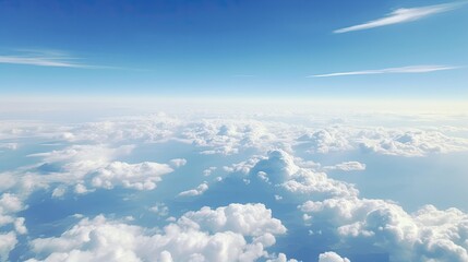 View from airplane window overlooking fluffy clouds