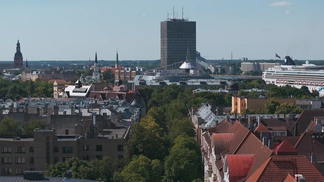 Huge cruise - Norwegian Dawn - ship docked in the center of Riga, Latvia. Aerial view of Riga city.