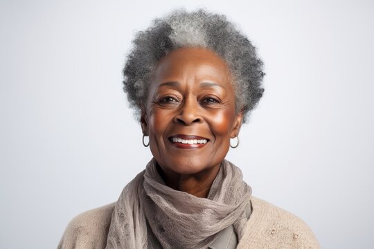 close-up portrait of a senior old black african american woman with grey hair, studio photo, isolated on white background. Generative AI